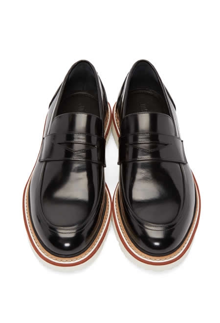 JIMMY CHOO black leather loafers.